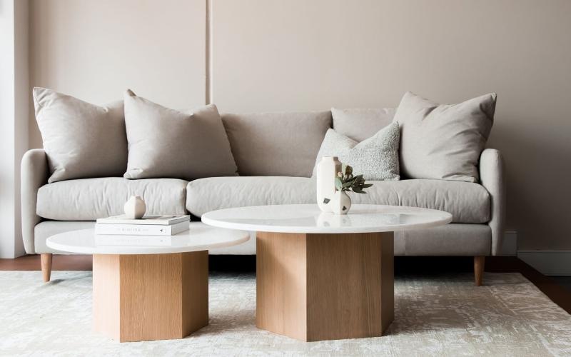 a white couch with a coffee table